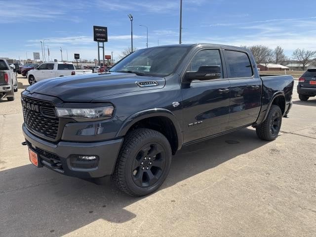 2026 RAM Ram 1500 RAM 1500 BIG HORN CREW CAB 4X4 5'7' BOX in Forged Blue Metallic Exterior Paint — front three-quarter view