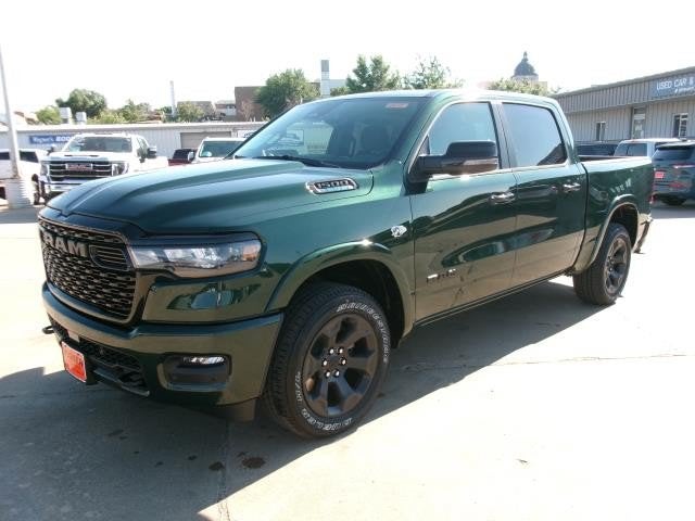2026 RAM Ram 1500 RAM 1500 BIG HORN CREW CAB 4X4 5'7' BOX in Serrano-Green Metallic Exterior Paint — front three-quarter view