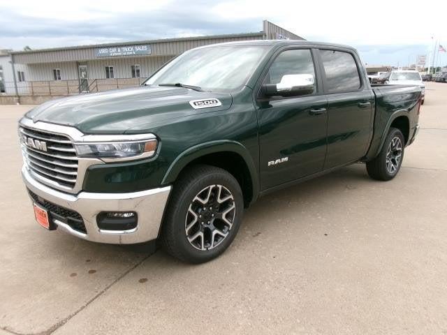 2026 RAM Ram 1500 RAM 1500 LARAMIE CREW CAB 4X4 5'7' BOX in Serrano-Green Metallic Exterior Paint — front three-quarter view