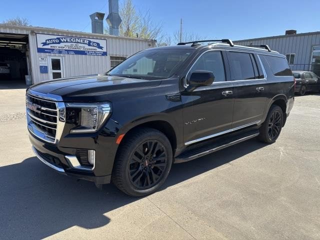 2023 GMC Yukon XL SLT in Onyx Black — front three-quarter view