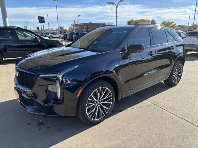 2024 Cadillac XT4 AWD Sport in Stellar Black Metallic — front three-quarter view