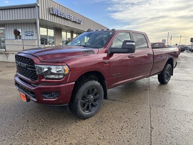 2023 RAM 3500 Big Horn Crew Cab 4x4 8' Box in Delmonico Red Pearlcoat — front three-quarter view