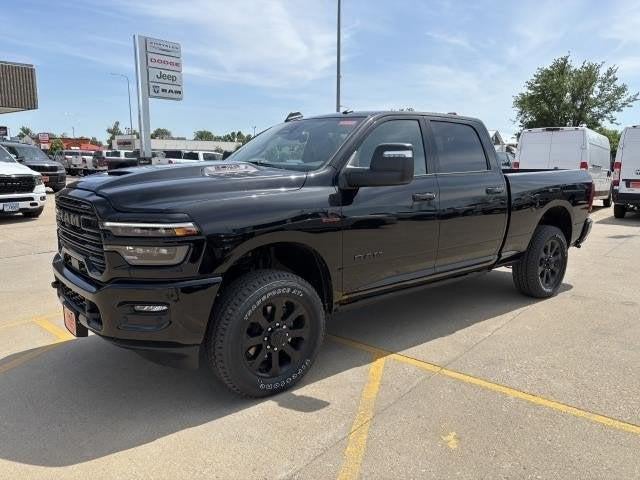 2025 RAM Ram 2500 RAM 2500 LARAMIE CREW CAB 4X4 6'4' BOX in Diamond Black Crystal Pearl-Coat Exterior Paint — front three-quarter view