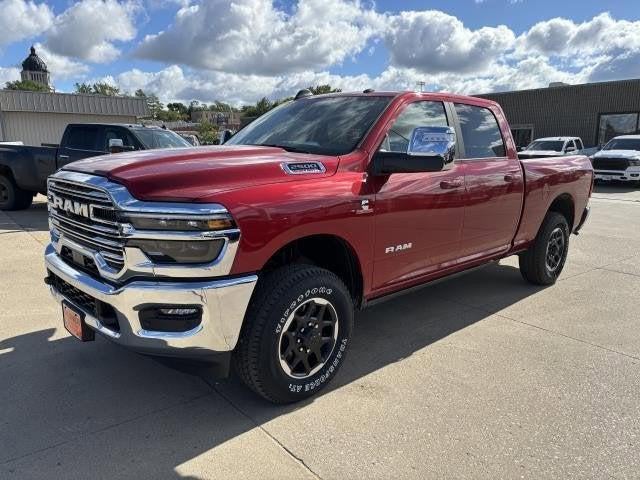 2026 RAM Ram 2500 RAM 2500 LARAMIE CREW CAB 4X4 6'4' BOX in Molten Red Pearl-Coat Exterior Paint — front three-quarter view