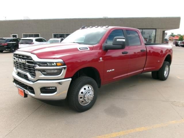 2026 RAM Ram 3500 RAM 3500 BIG HORN CREW CAB 4X4 8' BOX in Molten Red Pearl-Coat Exterior Paint — front three-quarter view
