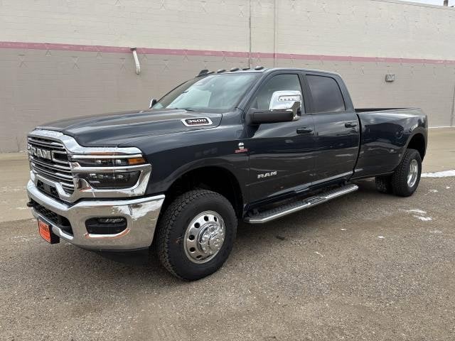 2026 RAM Ram 3500 RAM 3500 LARAMIE CREW CAB 4X4 8' BOX in Forged Blue Metallic Exterior Paint — front three-quarter view
