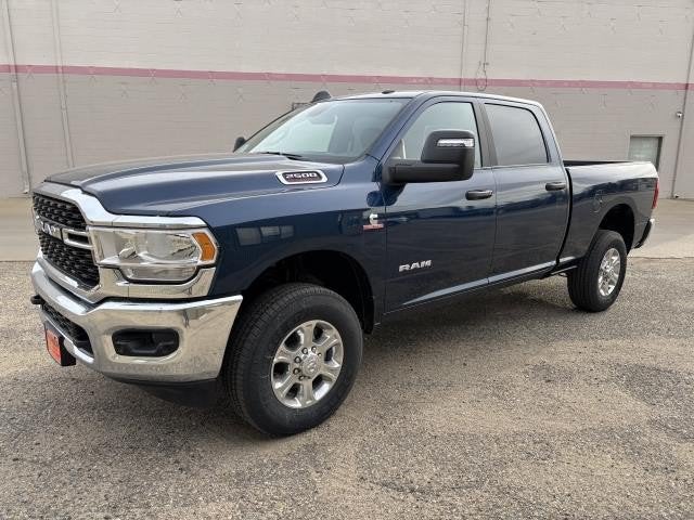 2024 RAM Ram 2500 RAM 2500 BIG HORN CREW CAB 4X4 6'4' BOX in Patriot Blue Pearl-Coat Exterior Paint — front three-quarter view