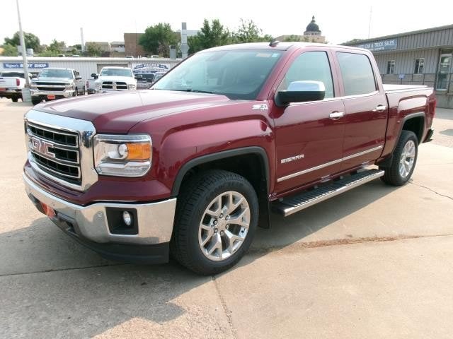 2014 GMC Sierra 1500 SLT in Sonoma Red Metallic — front three-quarter view