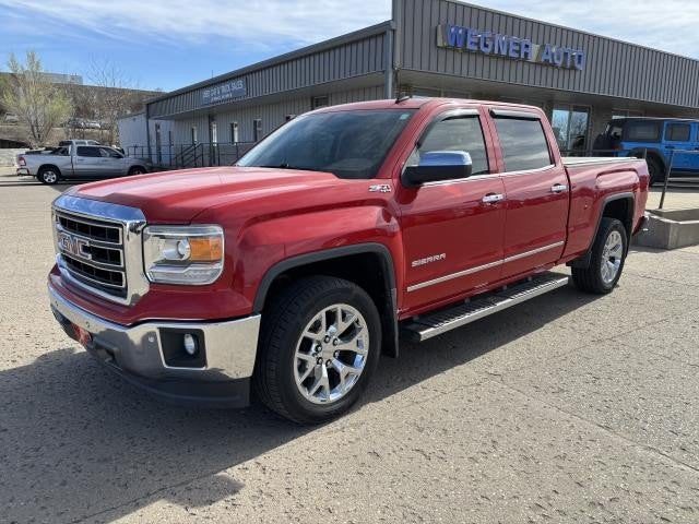 2014 GMC Sierra 1500 SLT in Fire Red — front three-quarter view