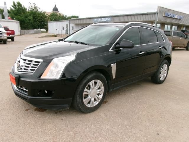 2014 Cadillac SRX Luxury Collection in Black Raven — front three-quarter view