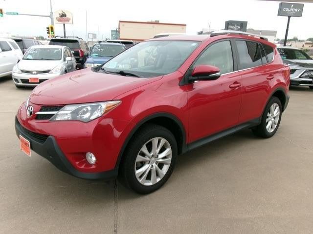 2013 Toyota RAV4 Limited in Barcelona Red Metallic — front three-quarter view